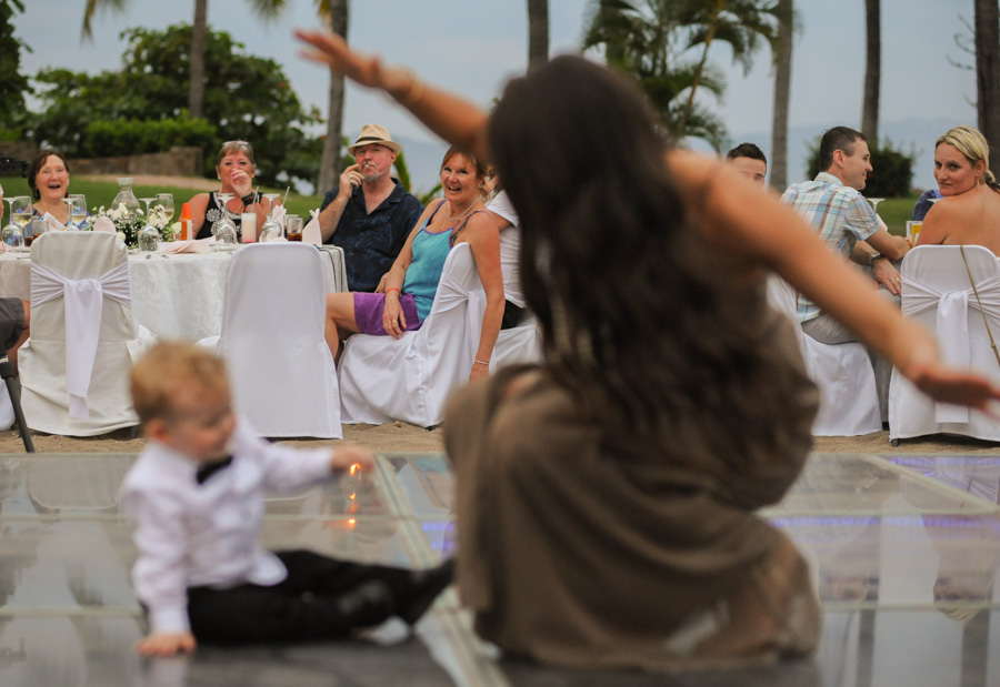 The wedding guests see the child