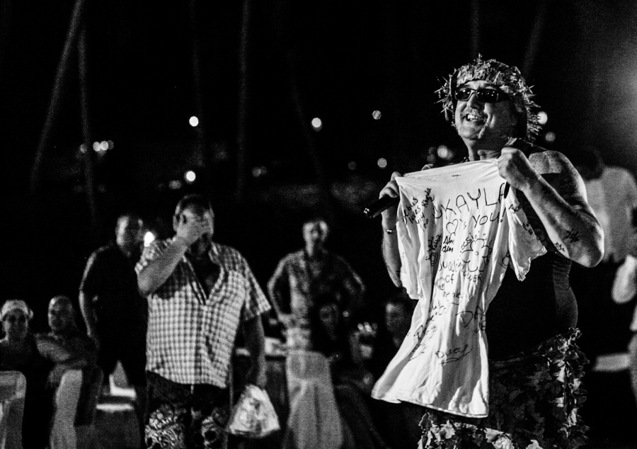 Crazy uncle giving a shirt to the bride