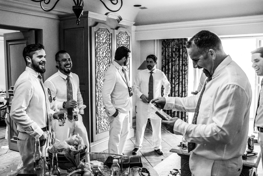 The groom talking with his friends
